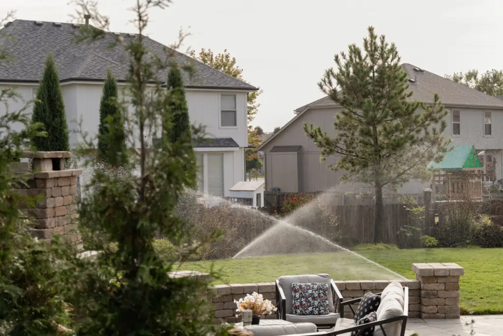 sprinklers watering grass